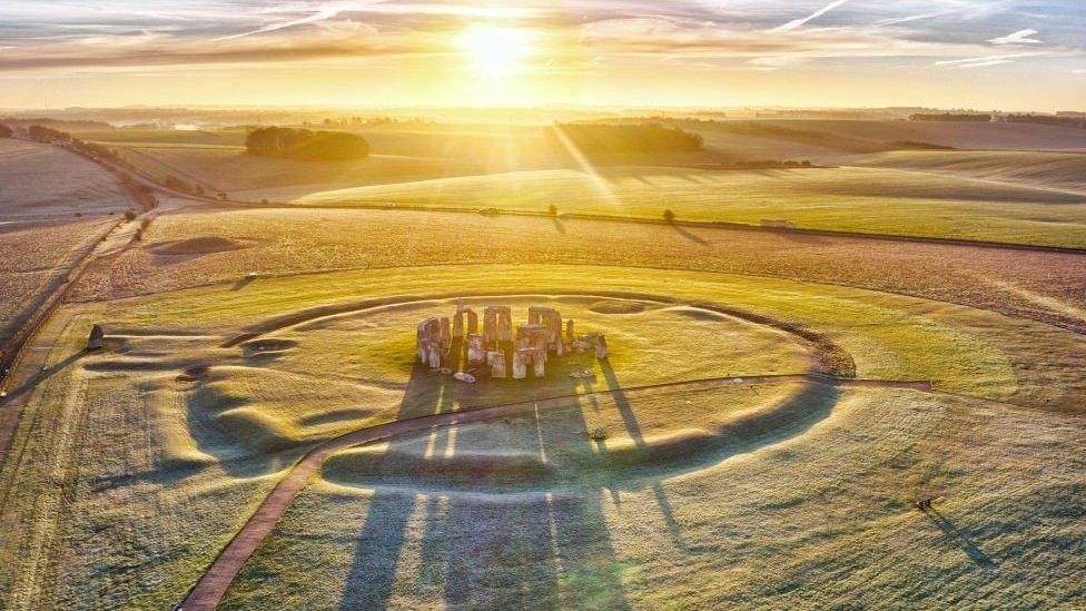 Stone Henge stones bathed in morning sunlight