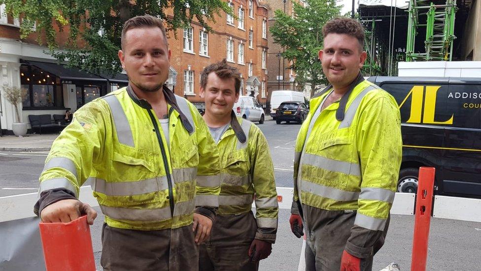 Labourers Peter Wackett, Jake Phillips and Luke Cahalane said they sweat lots in their overalls when it is hot