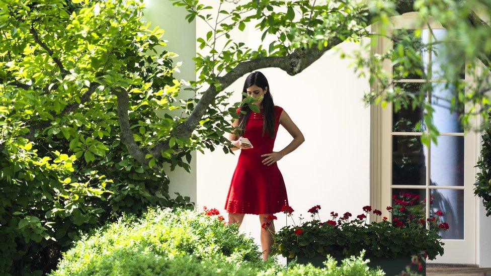 Madeleine Westerhout, secretary to US President Trump, stands outside the Oval Office in May 2018