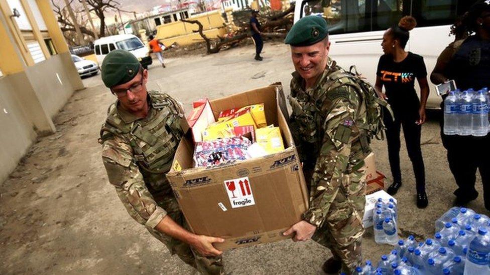 British soldiers carrying food aid in the British Virgin Islands