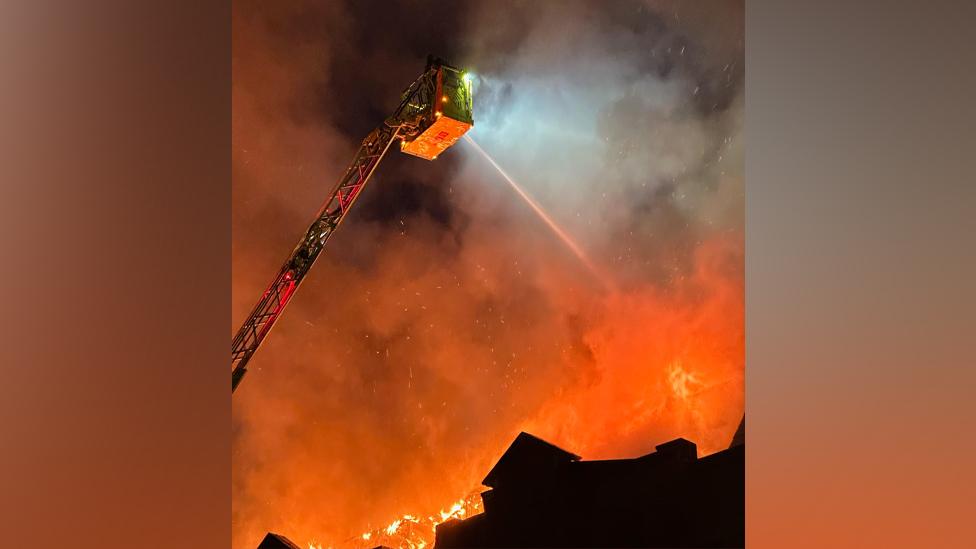 Firefighters fighting fire