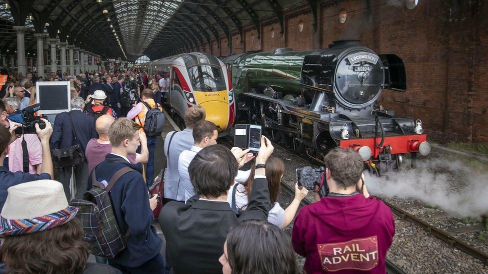 People photographing Flying Scotsman at Darlington train station