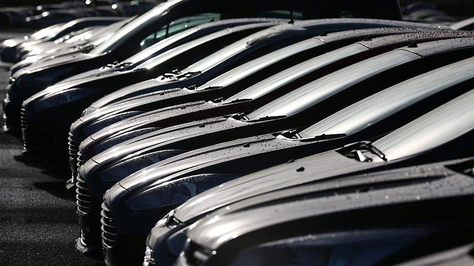 Row of cars in a factory car park