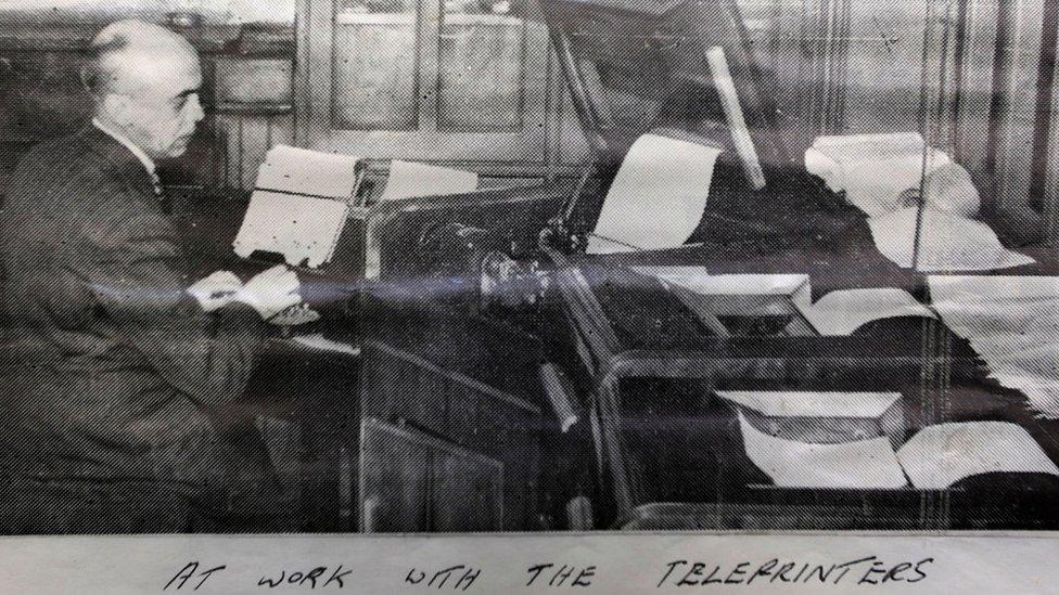 Archive picture of man at teleprinter