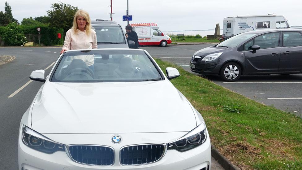 Melissa in her new BMW car