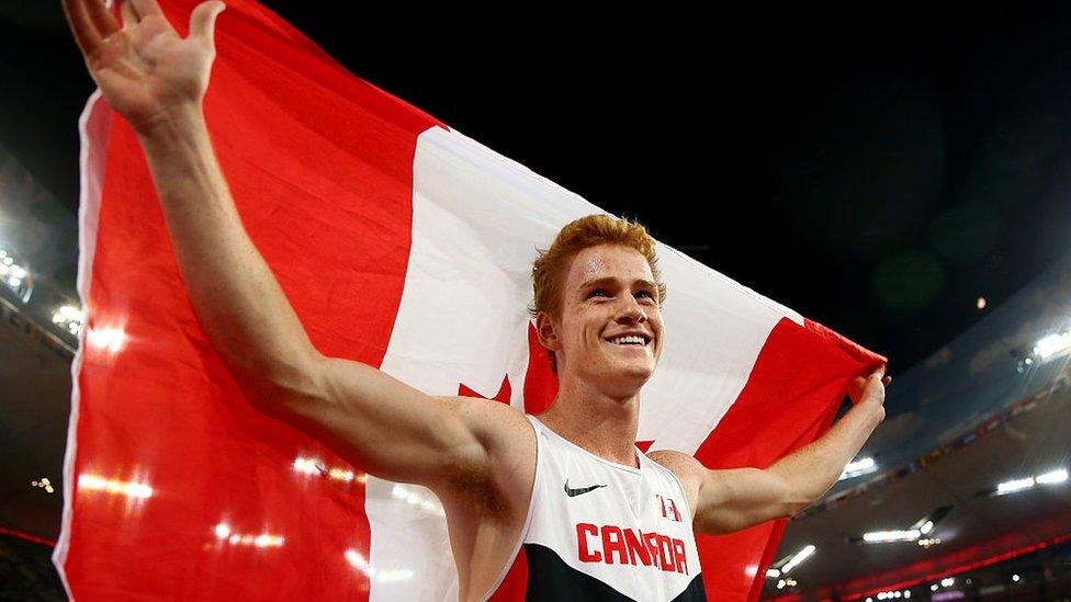 Shawnacy Barber of Canada celebrates after winning gold in the Men's Pole Vault final during day three of the 15th IAAF World Athletics Championships Beijing 2015