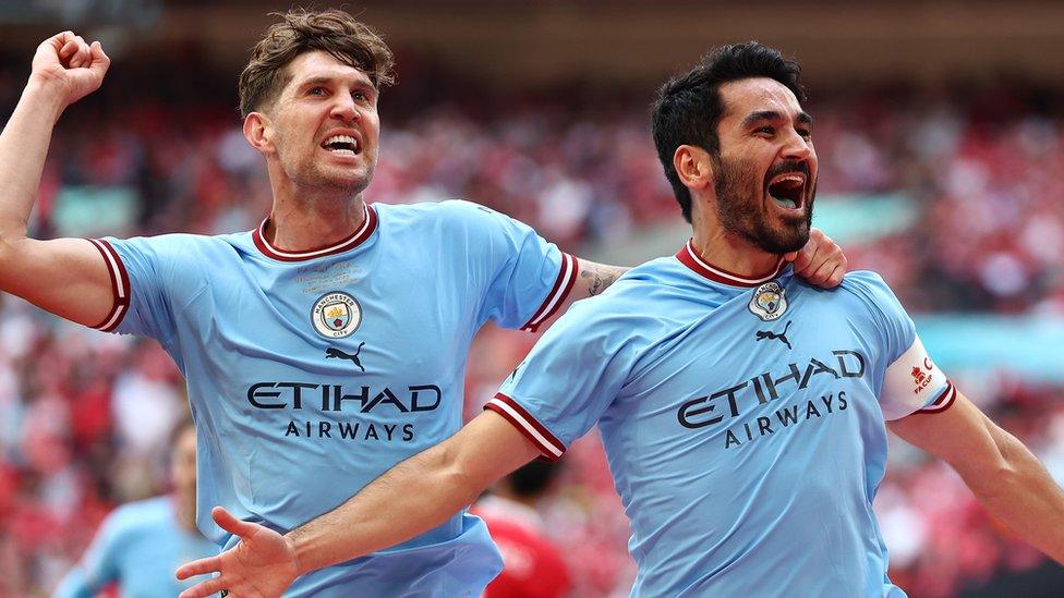 Illkay Gundogan and John Stones celebrating