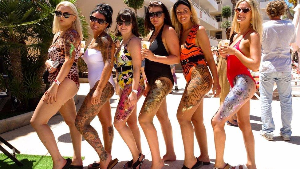 six women in the swimming costumes at an event in Magaluf