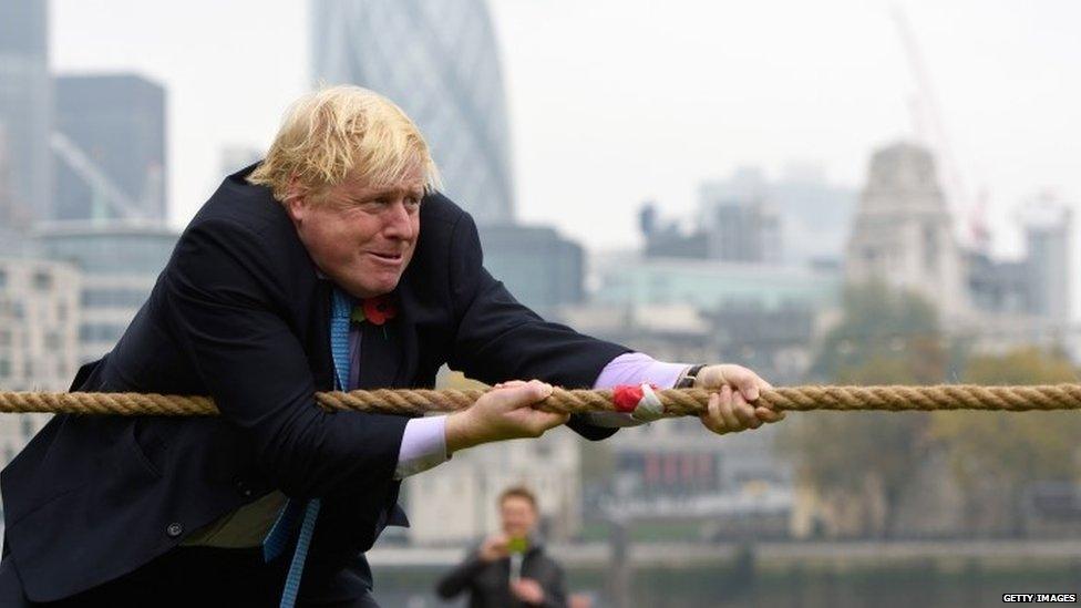 Boris Johnson taking part in a charity tug of war event