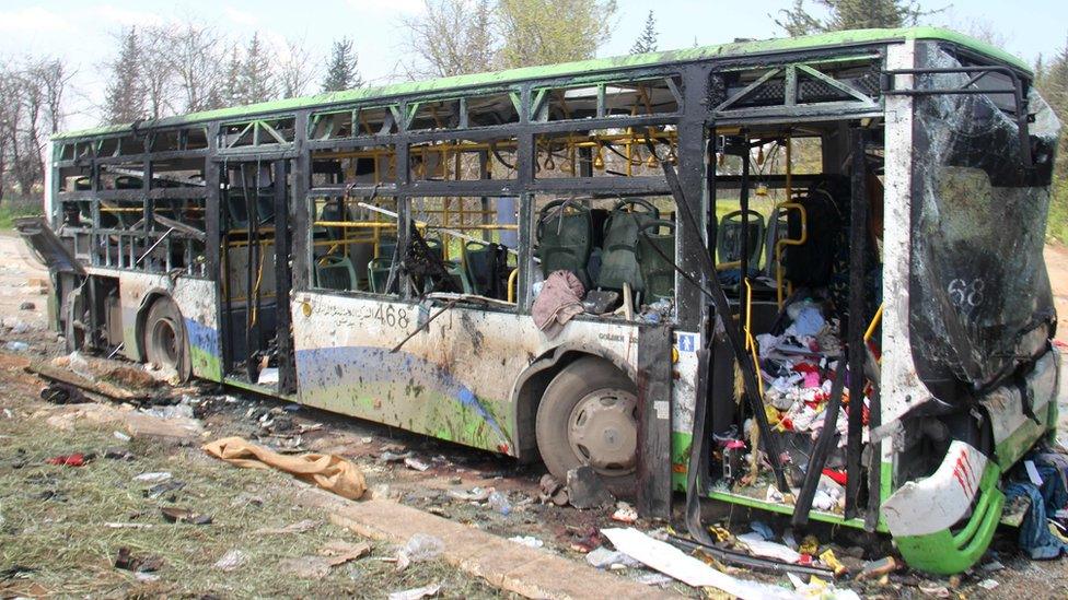 A picture taken on April 16, 2017, shows the damage a day after a suicide car bombing attack in Rashidin, west of Aleppo, targeted busses carrying Syrians evacuated from two besieged government-held towns of Foah and Kafraya