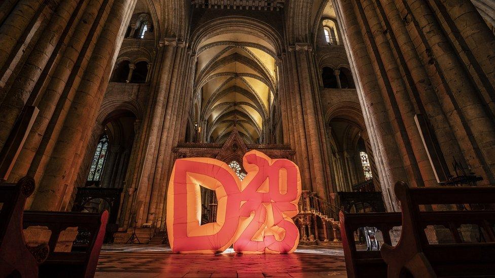 Inflatable D2025 symbol in Durham Cathedral