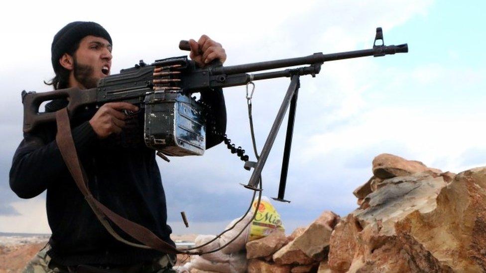 A rebel fighter near the restive Syrian city of Aleppo (25 February 2014)