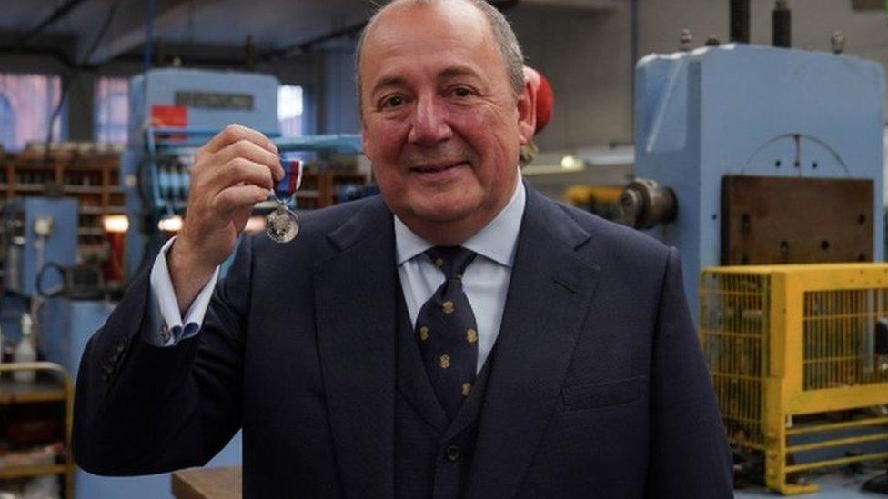 Phil McDermott with a medal