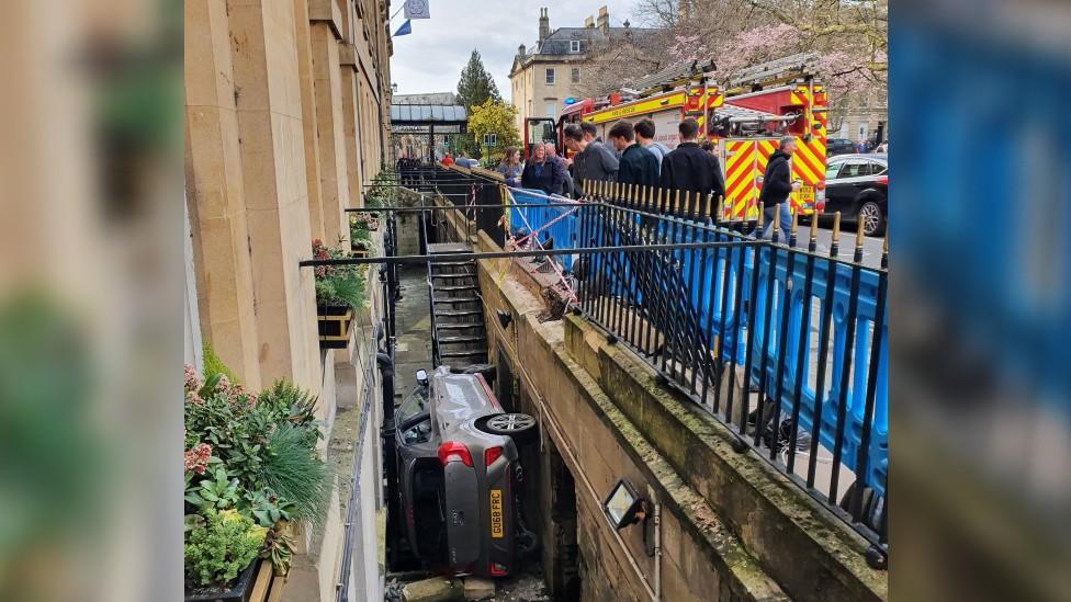 The car wedged against the Francis Hotel