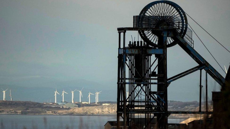 The winding wheel of Haig Colliery Mining Museum adjacent to the West Cumbria Mining offices which was given approval to extract coal last year