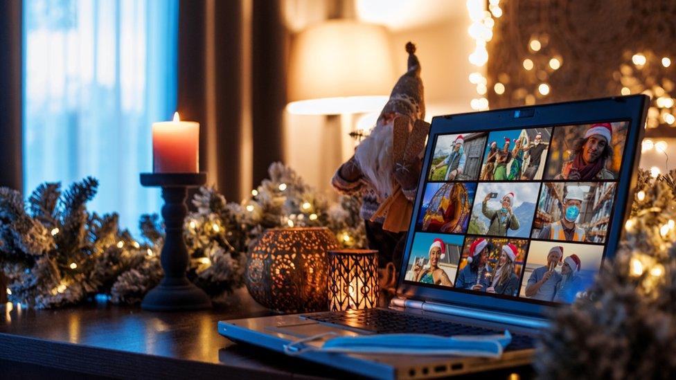 laptop-open-with-people-on-video-call-at-christmas