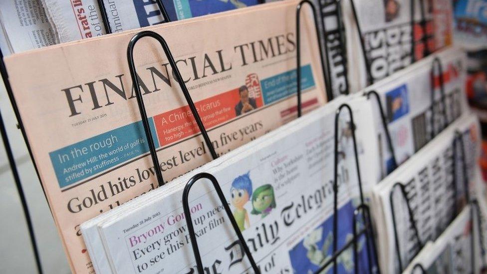 Newspapers on a stand