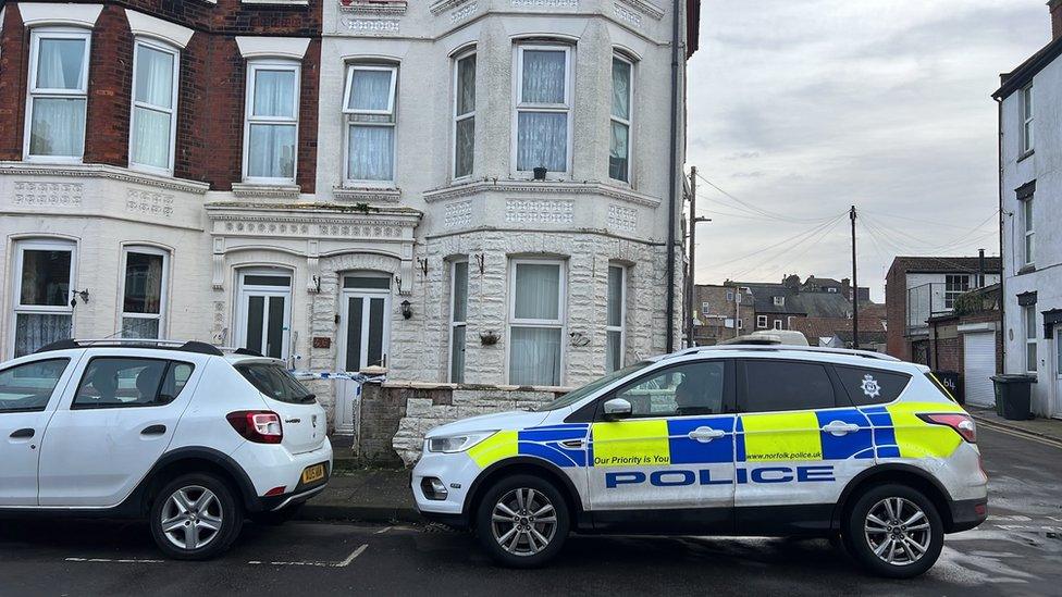 A police car parked outside a property in Great Yarmouth