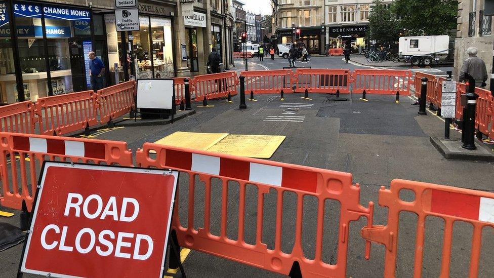 The cordoned off sink hole