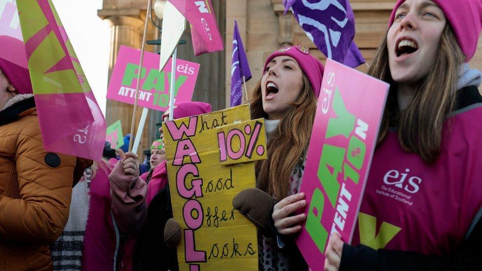 Striking teachers and supporters hold a rally on The Mound in Edinburgh