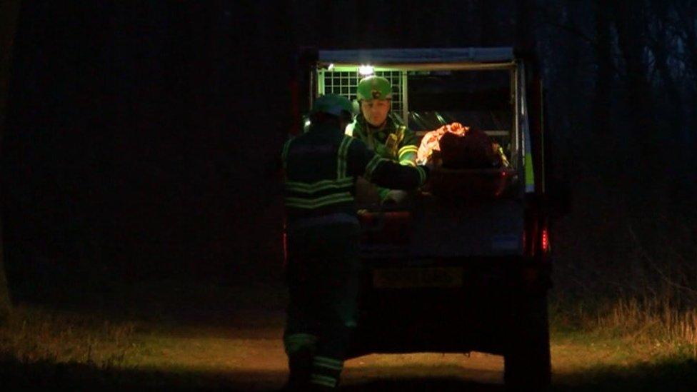 Paramedics use a specialist vehicle to remove the patient