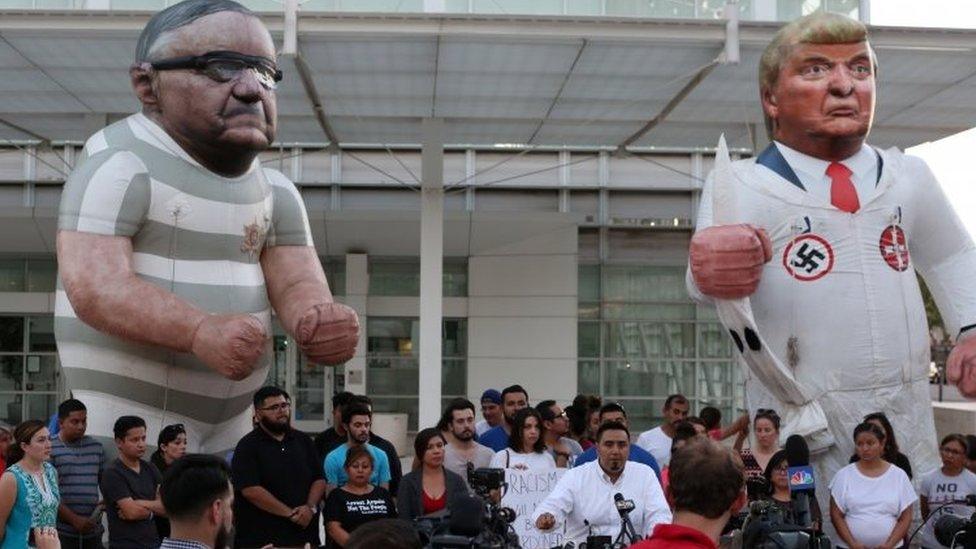 Local immigrants' rights organisations protest in Phoenix, Arizona, against the decision to pardon former Sheriff Joe Arpaio (25 August 2017)