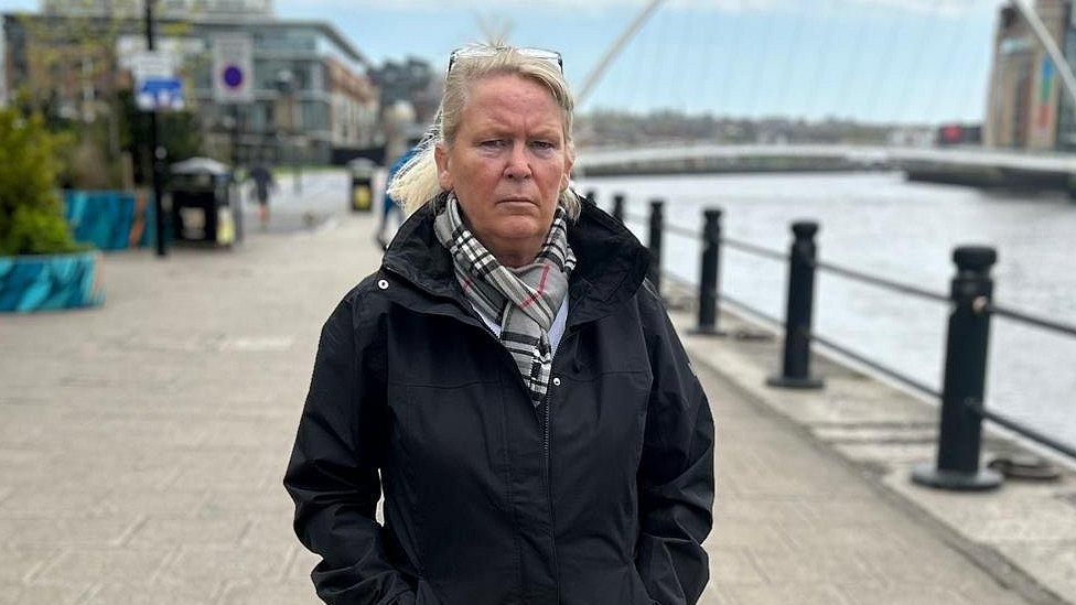 Sharon standing on the Newcastle quayside