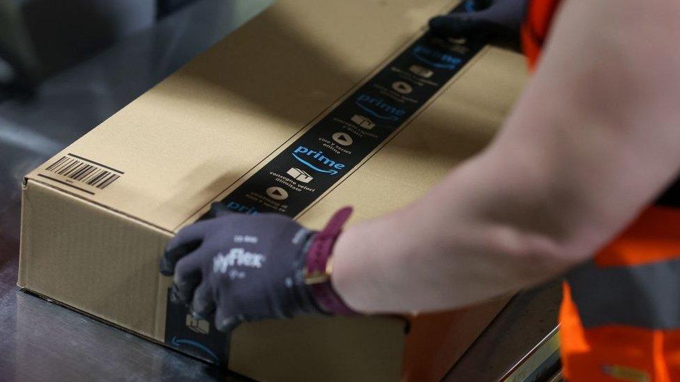 Man packing in Amazon box