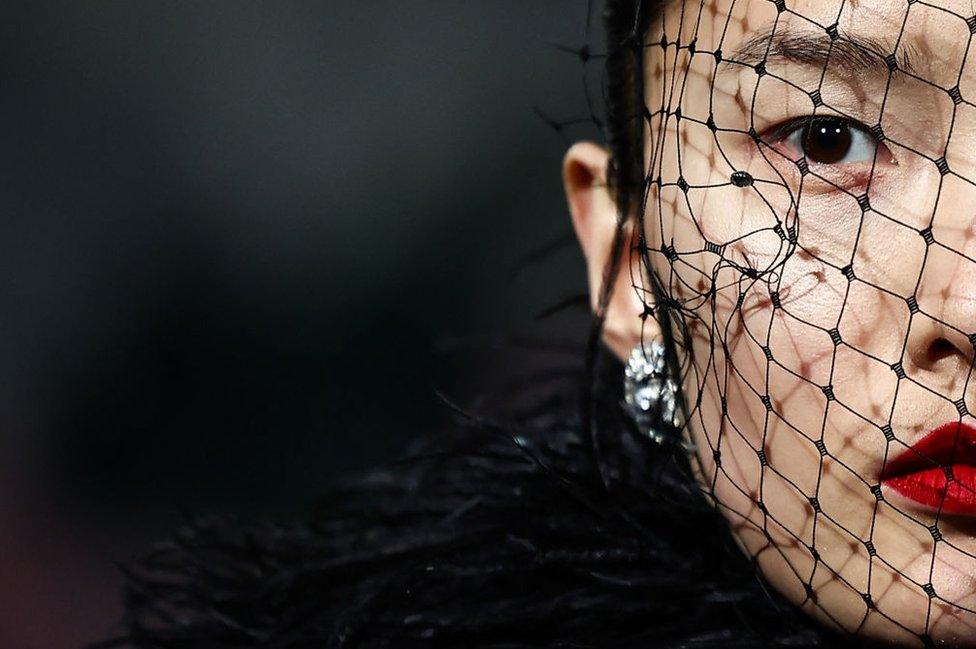 Models present creations by British designer Richard Quinn during the catwalk presentation for his Autumn/Winter 2024 collection during London Fashion Week in London on February 17, 2024.