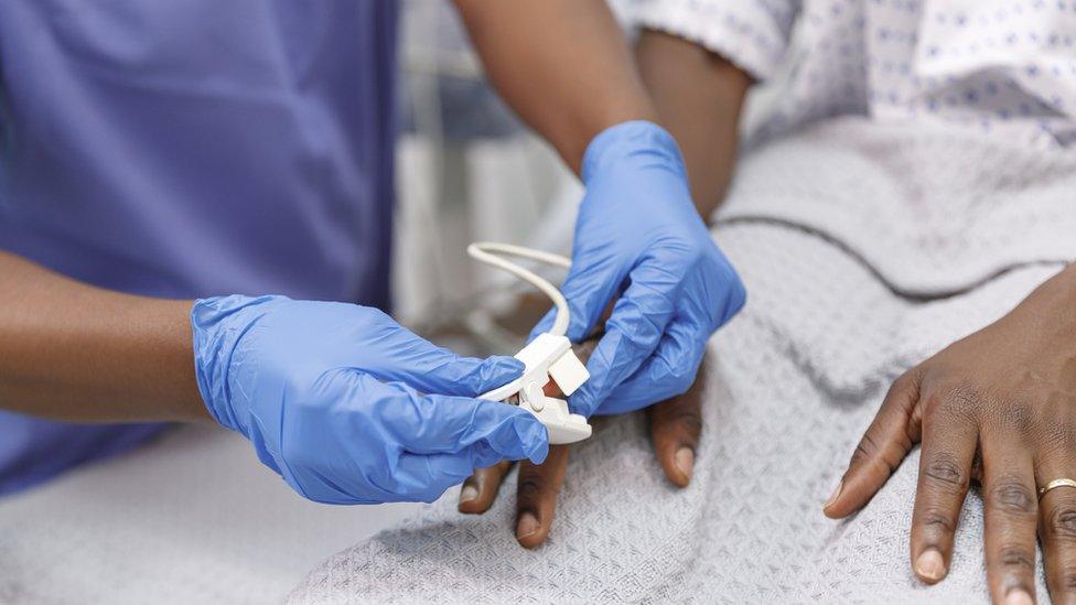 Nurse caring for patient