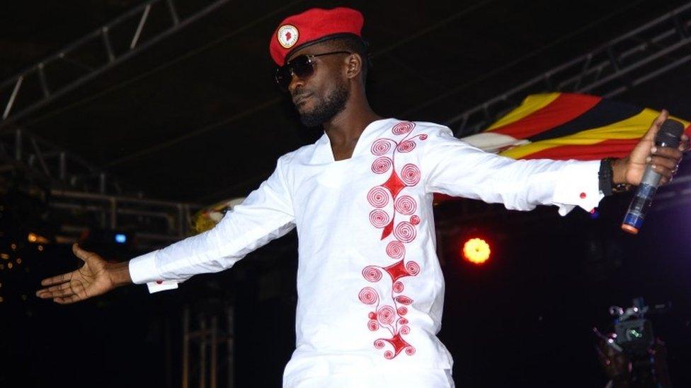 Bobi Wine appears on stage on the outskirts of Kampala