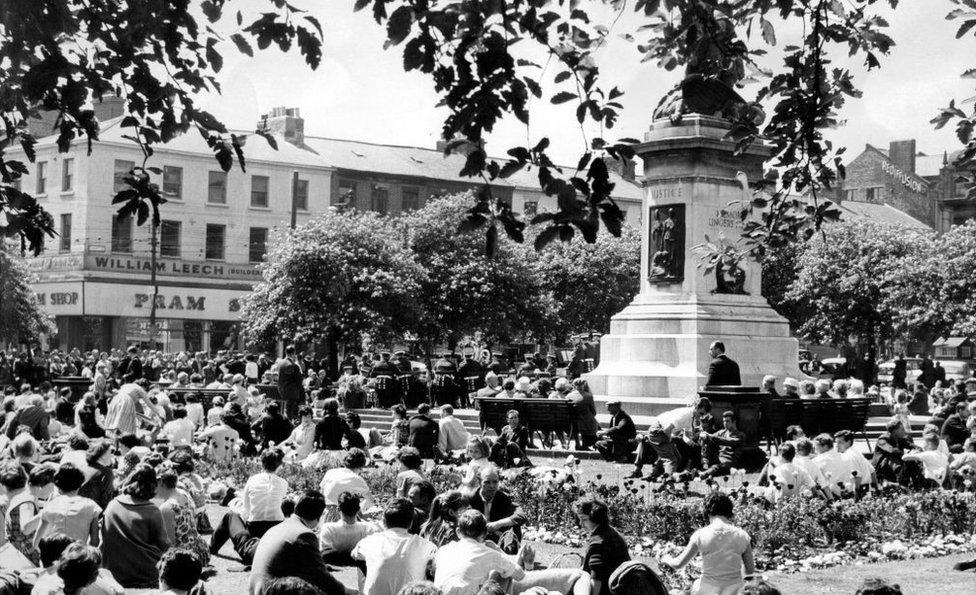 Old Eldon Square in 1962 with people sitting outside