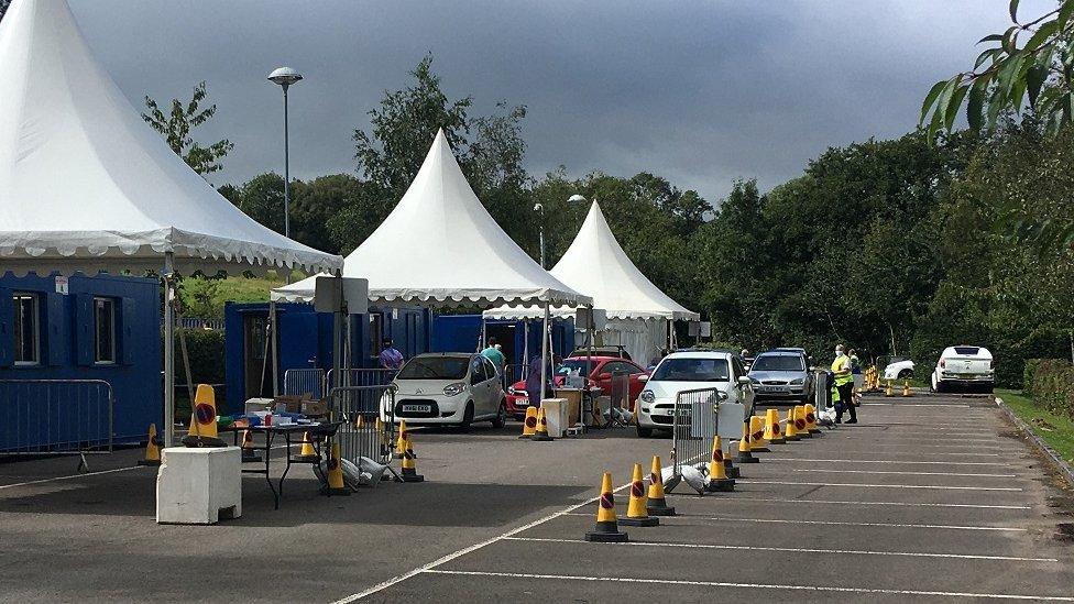 Traffic queuing at a testing centre in Tredomen