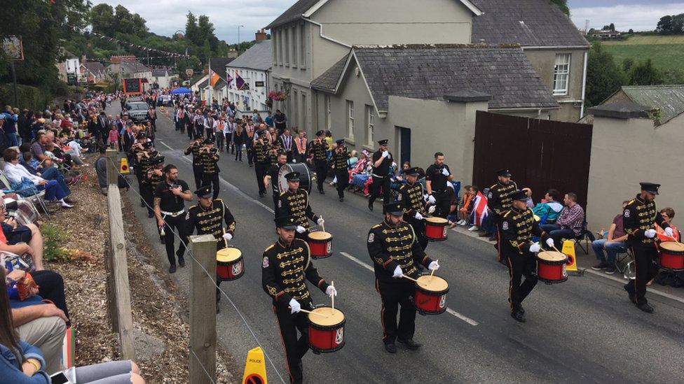 Orangemen and band members march in Loughgall, in County Armagh.