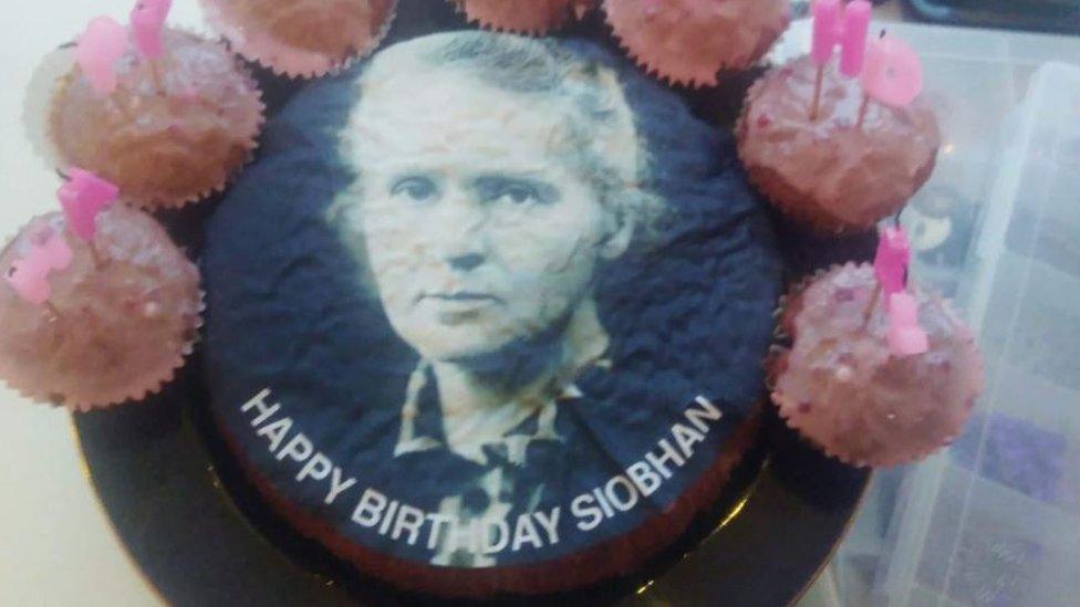 Cake with the face of Marie Curie on it