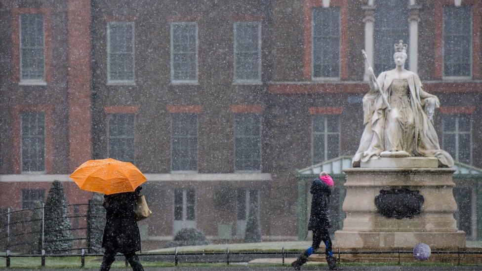 Snow falling outside Kensington Palace