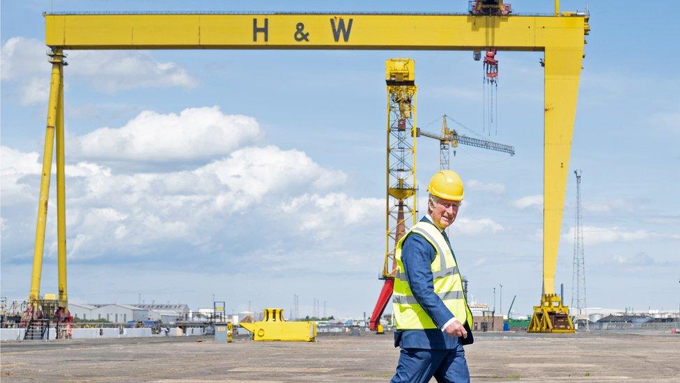 Prince Charles was pictured in front of the cranes which dominate Belfast's skyline