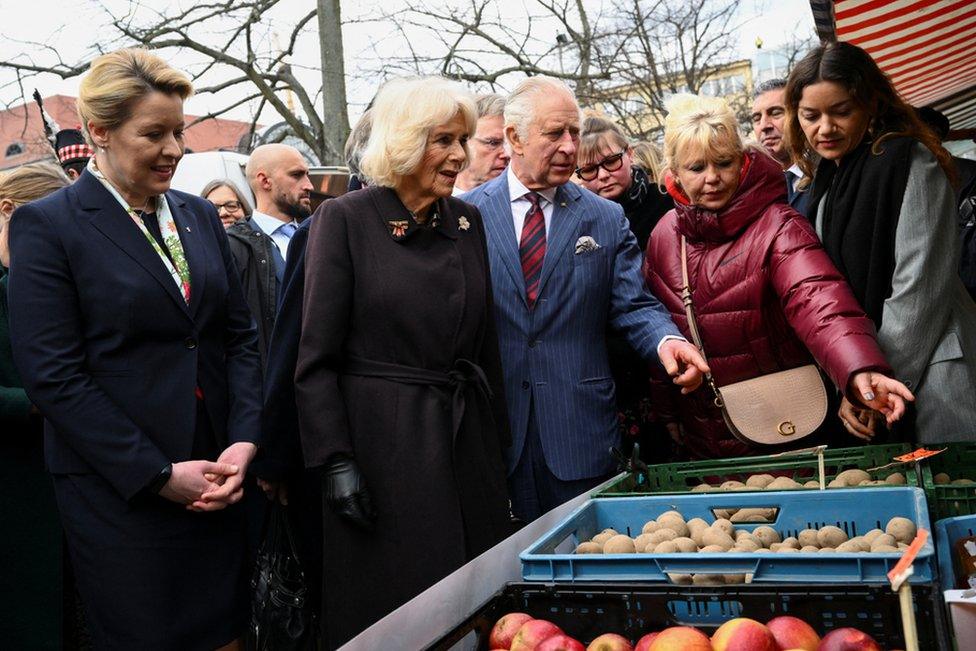 Berlin's Mayor Franziska Giffey, King Charles and Camilla, the Queen Consort, visit a farmer's market on Wittenbergplatz, a public square in Berlin