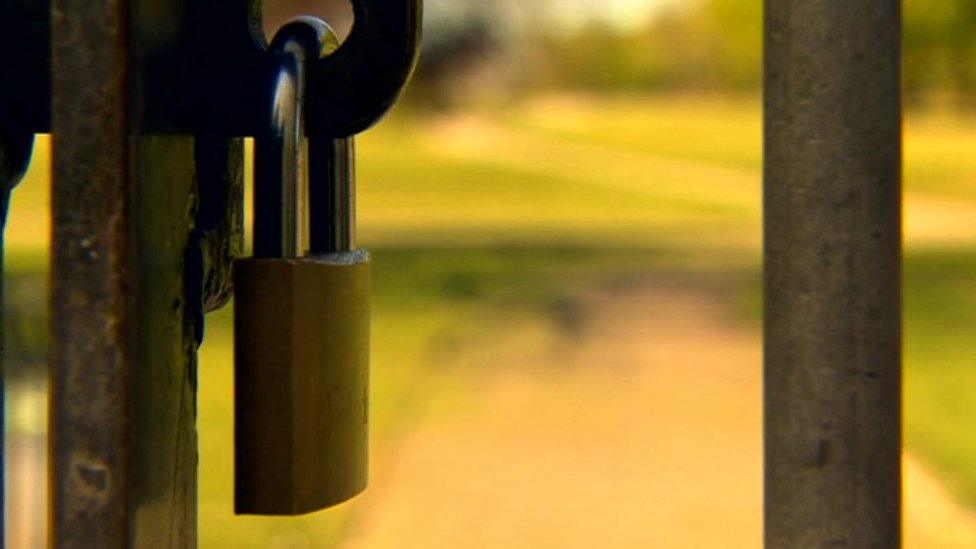 Padlock on gate