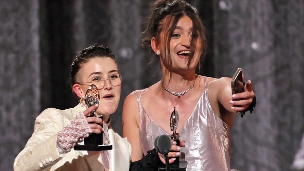 Lucy Moss (left) and Toby Marlow accepting their Tony Award for best score for Six: The Musical