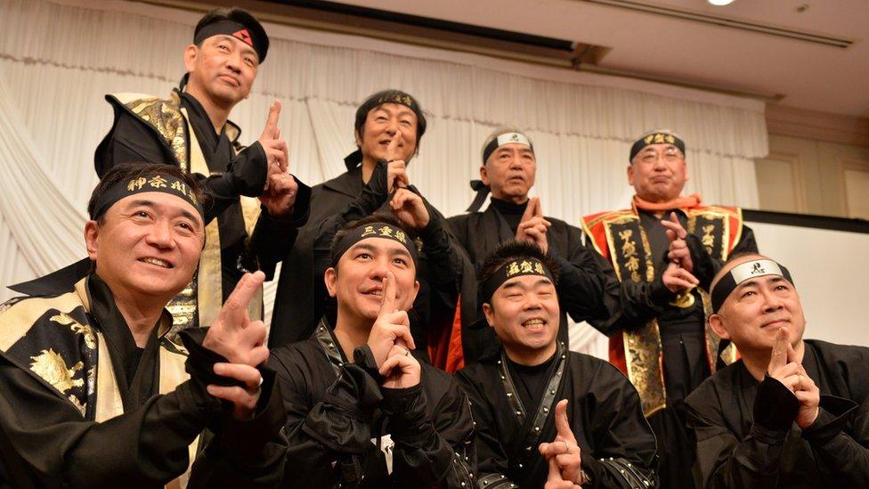 Governors and mayors from Mie pose in ninja costumes as they seek to encourage tourism.