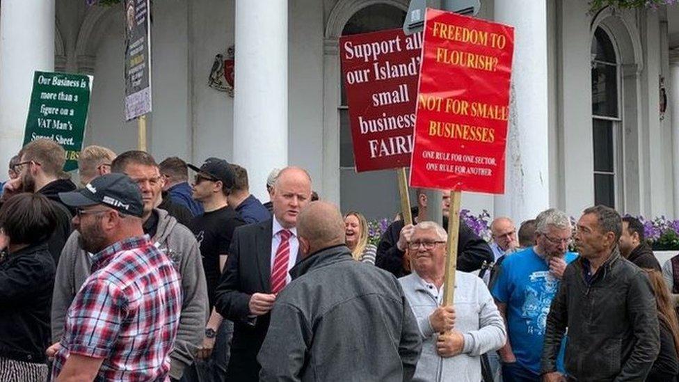 Protesters outside Tywnald buildings