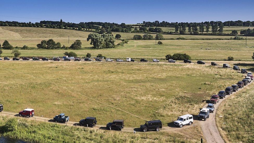 Parade of Land Rovers and Range Rovers at the Billing Off Road Show near Northampton.