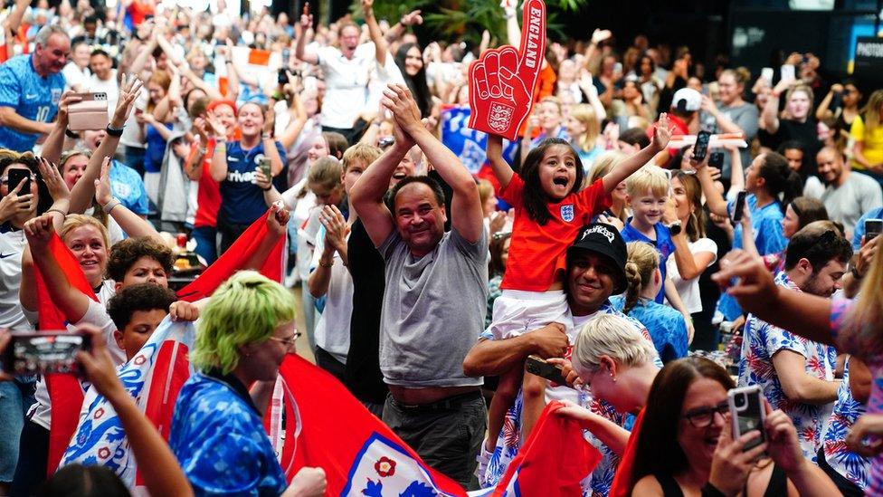 Crowds celebrating England's semi-final win in Croydon