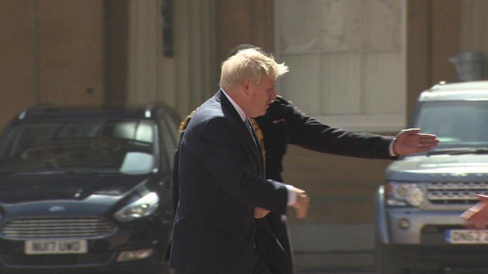 Boris Johnson arrives at the Palace