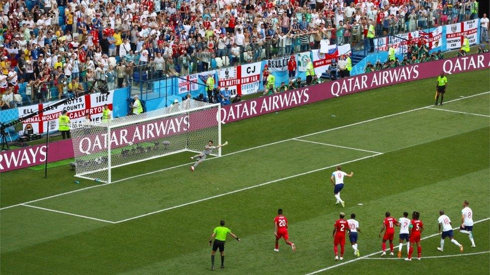 Harry Kane scores his second penalty against Panama, sending the 'keeper diving the wrong way.