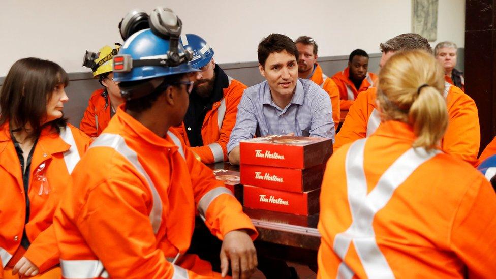 Canada's Prime Minister Justin Trudeau meets with steel workers from Stelco Hamilton Works, in Hamilton, Ontario, Canada