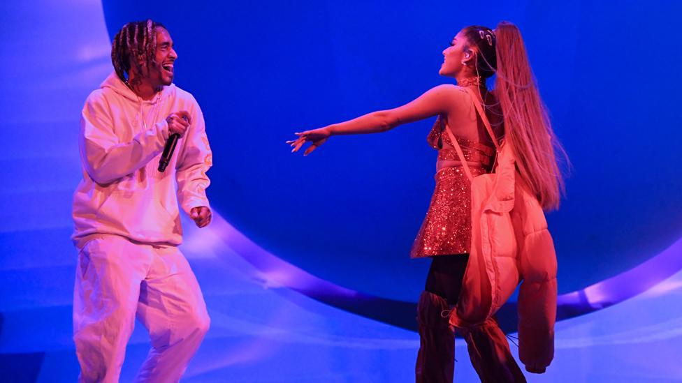 Ariana Grande shares a giggle with Mikey Foster of Social House