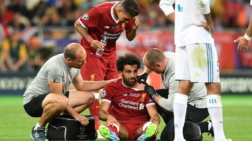 Mohamed Salah receives treatment during the Champions League final