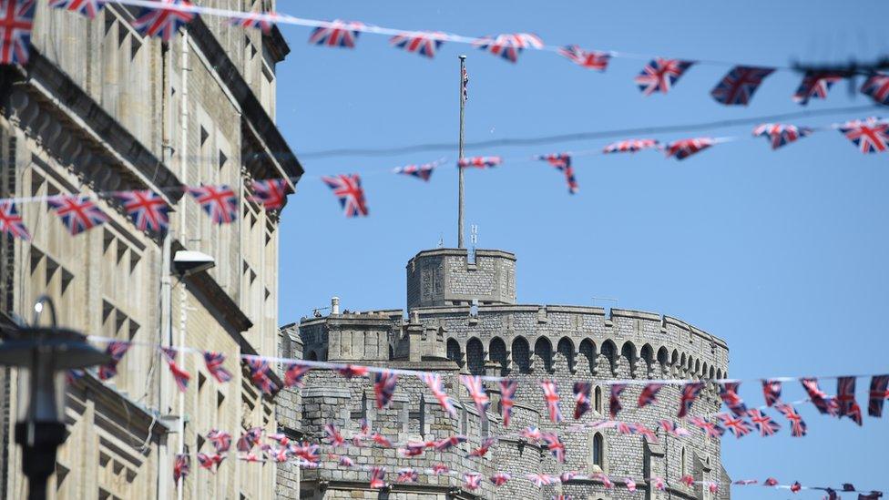 Union Jack flags are on display in front of Windsor Castle